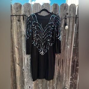 AJ Bari Beaded Silk Formal Dress With Illusion Neck and Long Sleeves Midi Length